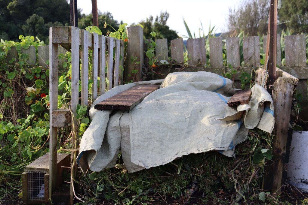 cover the compost to protect it